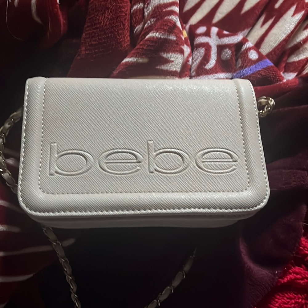 brand is bebe color is cream